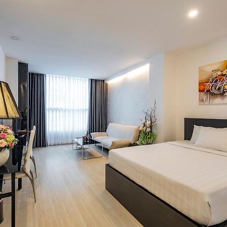 The One Premium Hotel Ho Chi Minh City Exterior photo